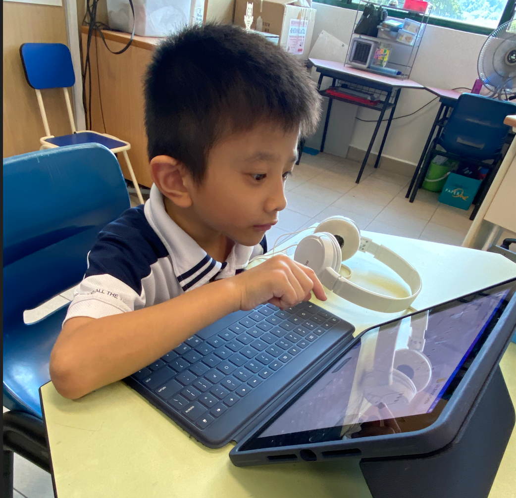 A student extending his learning of a math concept through the use of online manipulatives